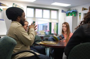 Poet Derrick Weston Brown speaks with students at Atholton High School. (Photo by Paige Feilhauer)