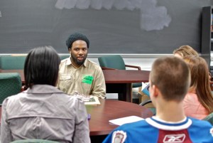 Poet Derrick Weston Brown speaks with students at Atholton High School. (Photo by Paige Feilhauer)