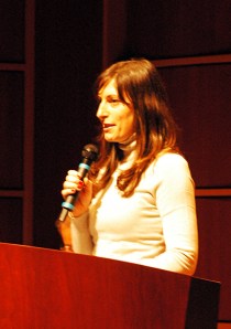 Amanda Fiore reads her workshop poem at the evening event. 