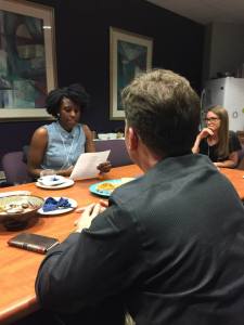 Nsikan reading her poem to Taylor Mali